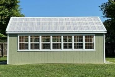 Greenhouse shed pictured from the side.