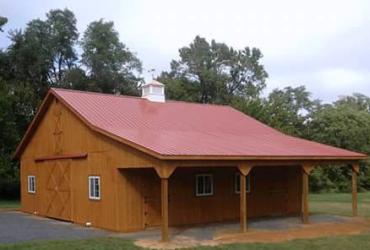 large equine shed with center aisle and overhang