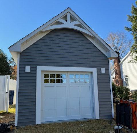 Blue Garage Shed with roll-door